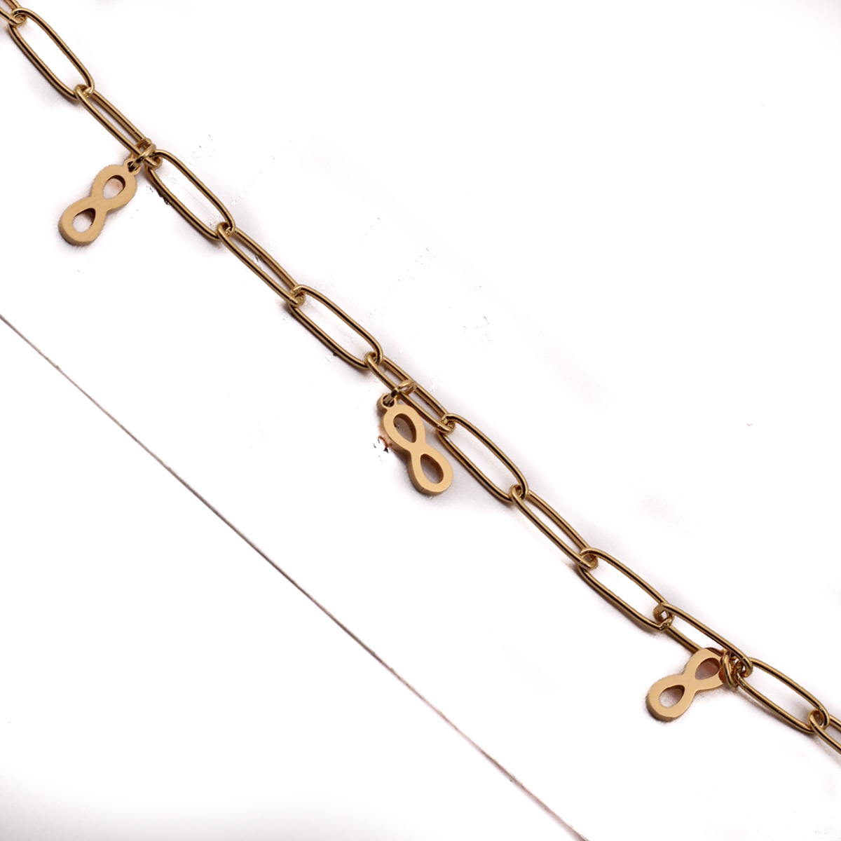 PUL22316 Pulsera Acero dorada Eslabon grande y dijes chicos