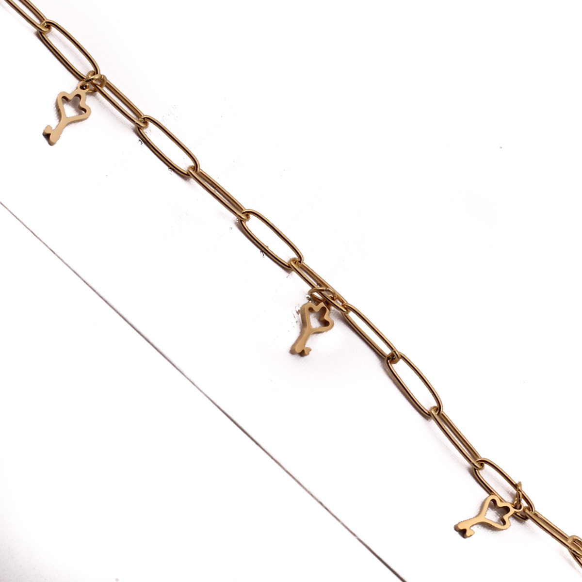 PUL22316 Pulsera Acero dorada Eslabon grande y dijes chicos