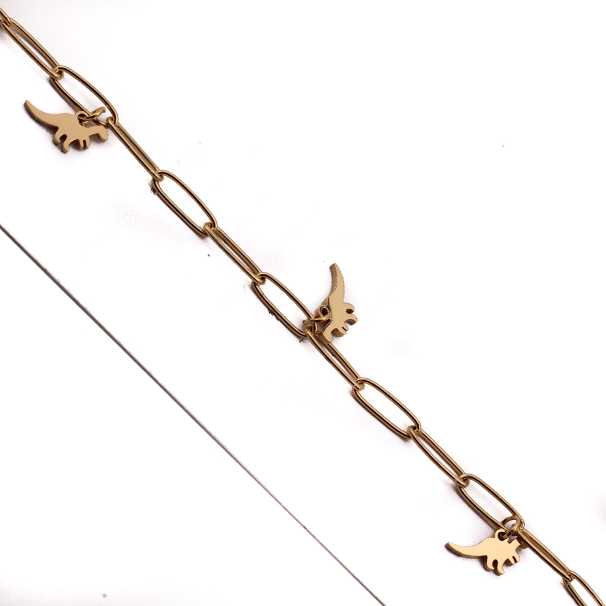 PUL22316 Pulsera Acero dorada Eslabon grande y dijes chicos