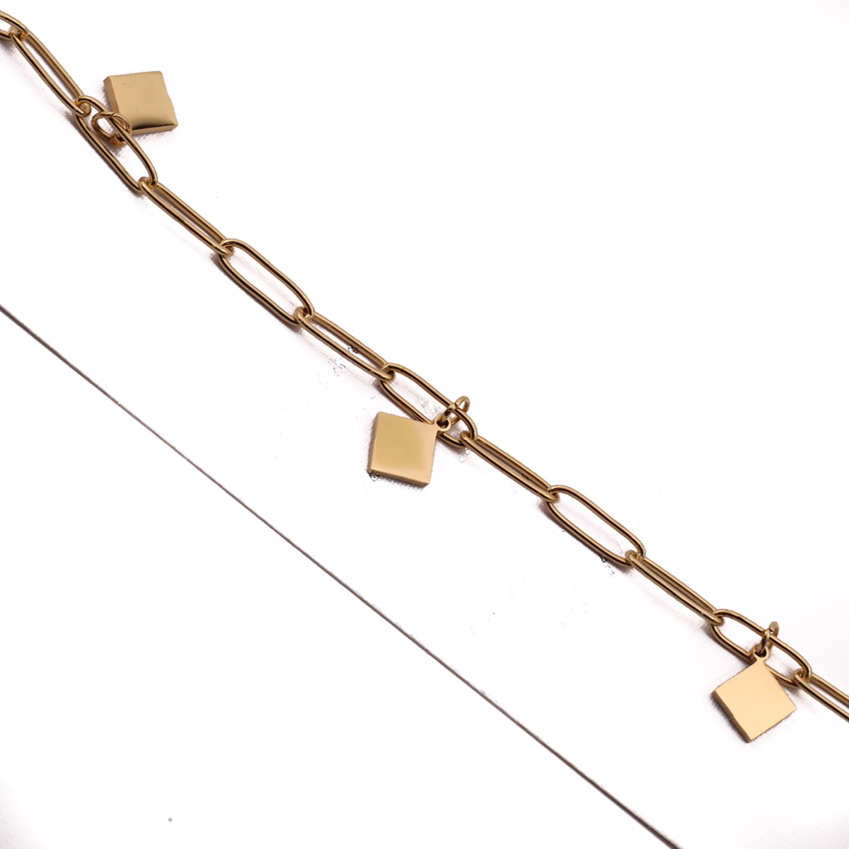 PUL22316 Pulsera Acero dorada Eslabon grande y dijes chicos