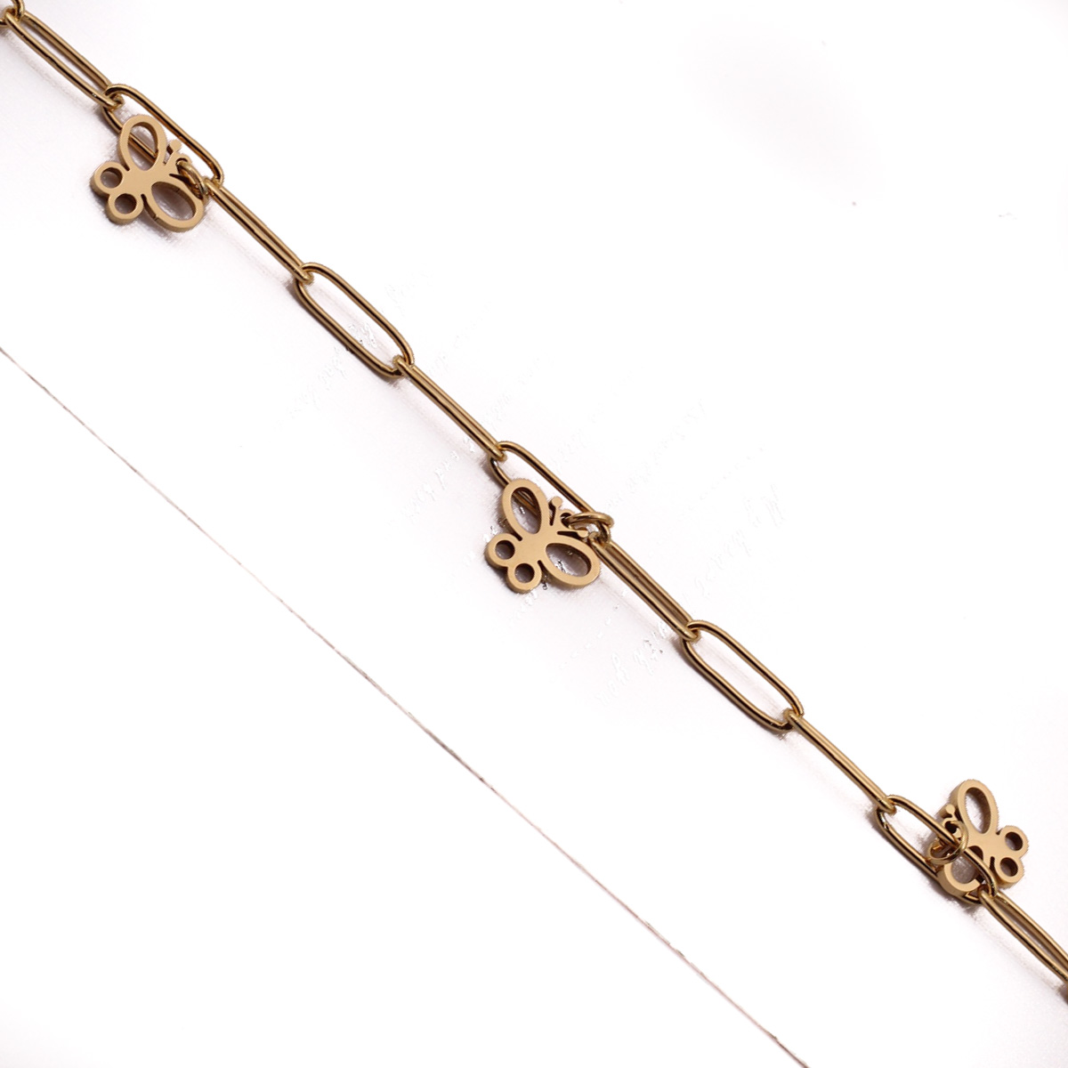 PUL22316 Pulsera Acero dorada Eslabon grande y dijes chicos