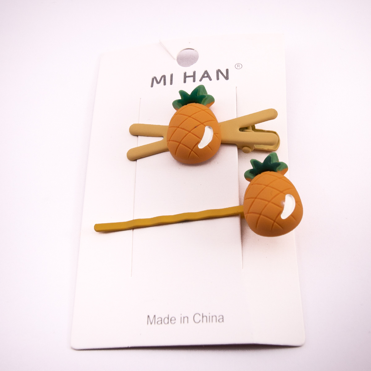 A80 05	Duo pasador y pinza p/cabello PIÑA